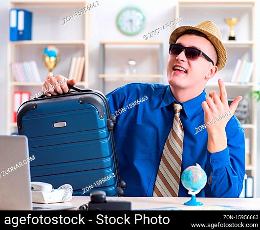 The young employee preparing for vacation trip