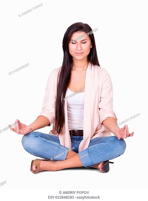 Serene beautiful woman meditating
