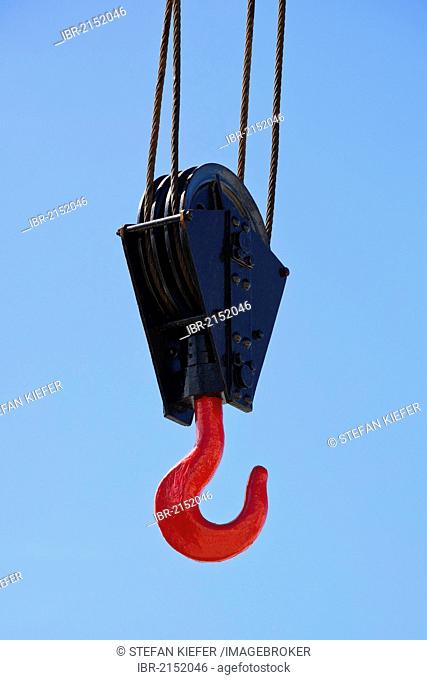 Crane hook against a blue sky in Lisbon, Portugal, Europe