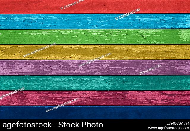 Old wood planks with peeling paint, rustic background or header with space for text, diversity concept