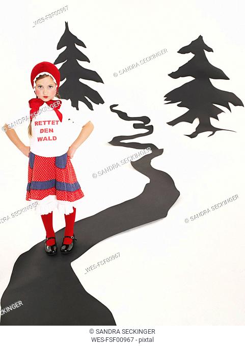 Portrait of little girl dressed up as Red Riding Hood