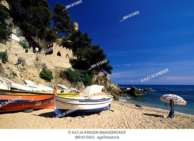 Fishing boats on the beach of Lloret de Mar, Costa Brava, Catalonia, Spain, Europe