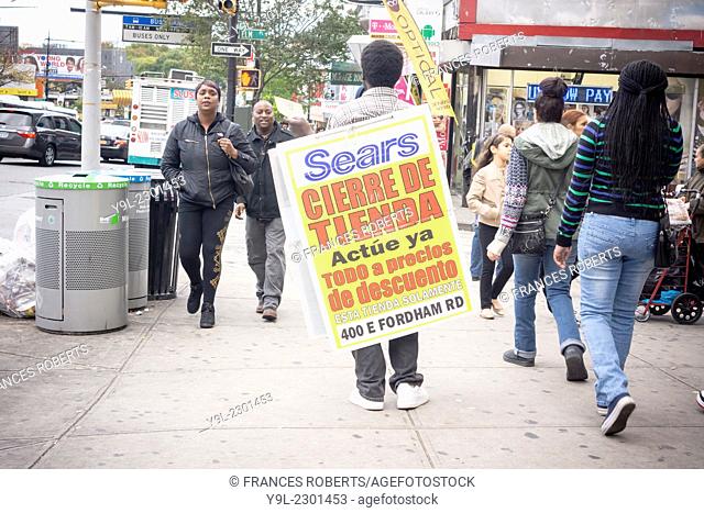 Sandwich board in Spanish advertises the closing Sears store in the New York borough of the Bronx. Sears Holdings announced that it will close 77 Sears and...