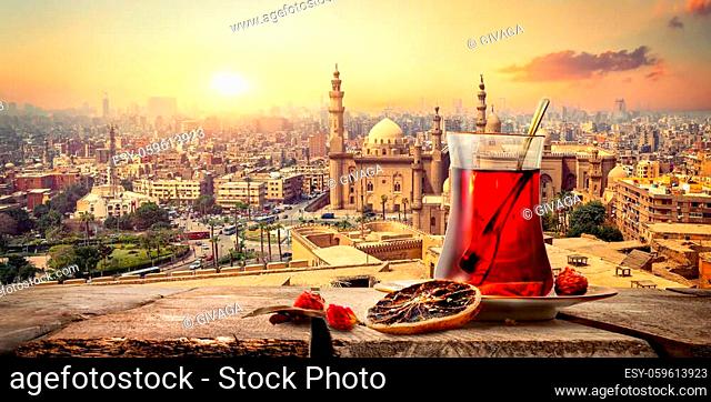 View of the Mosque Sultan Hassan in Cairo and hibiscus tea