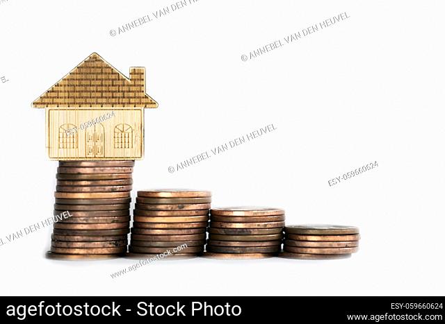 coins saving setting stairs up to house model for concept investment mortgage loan finance and business isolated on white background climbing stairs