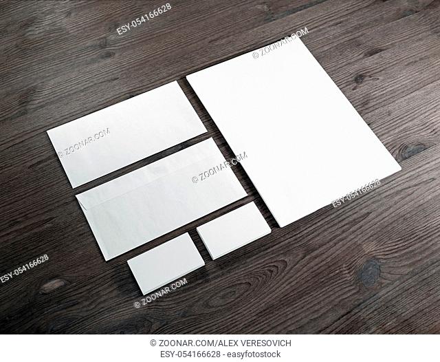 Blank corporate identity template on wooden background. Photo of blank stationery set. Mockup for branding identity