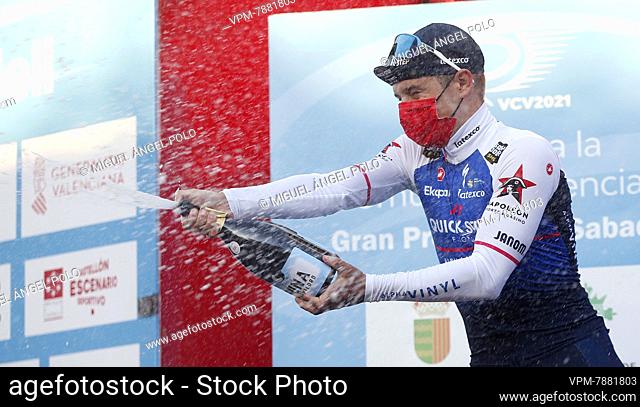 Belgian Remco Evenepoel of Quick-Step Alpha Vinyl celebrates on the podium after the fifth and last stage of the 'Volta a la Comunitat Valenciana' Tour of...
