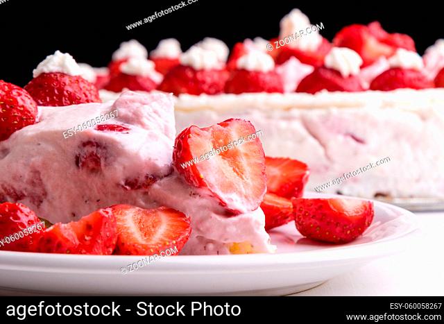 homemade fresh strawberry cake with whipped cream