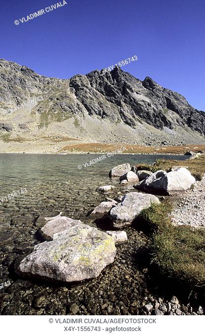 Granite boulders on the shore of the largest tarn in High Tatras Slovakia - Velke Hincove pleso