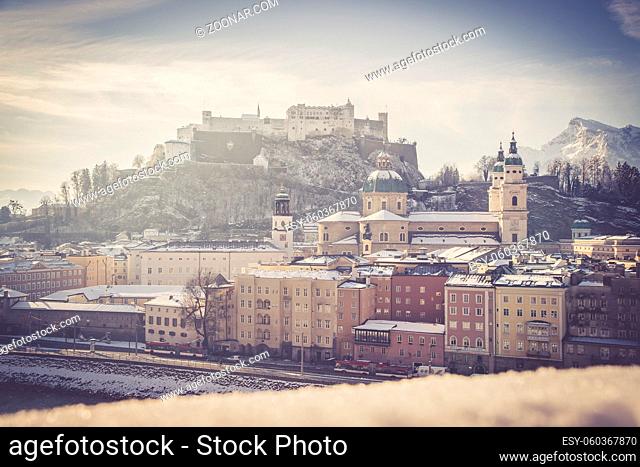 Salzburg historic district at Christmas time, snowy rooftops with sunshine, Austria