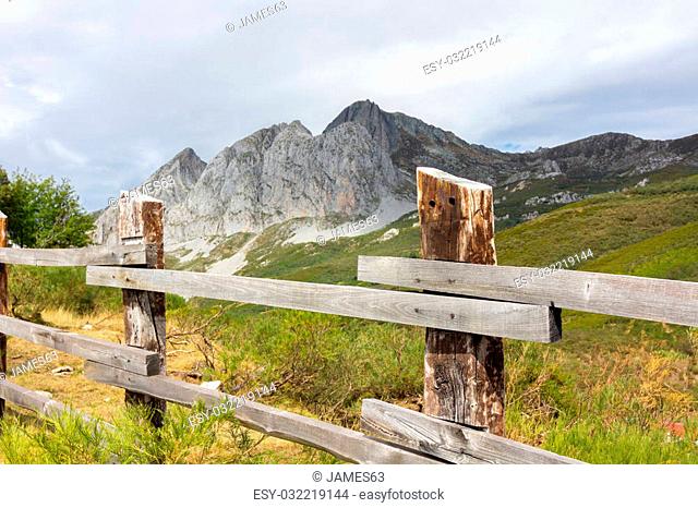 wooden fence in high mountain meadow