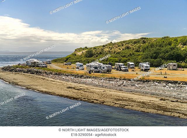 USA, WA, Whidbey Island, Coupville. RV's at a campground on Penn Cove, in the San Juan Islands