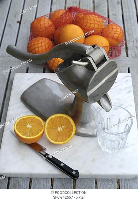 Juice press for making freshly pressed orange juice