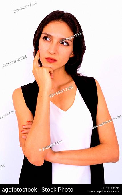 Studio shot of young beautiful businesswoman against white background