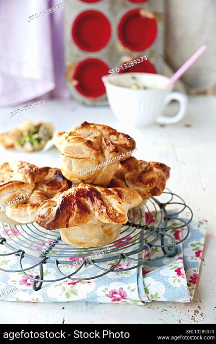 Puff pastry mozzarella pies filled with ham and mushrooms
