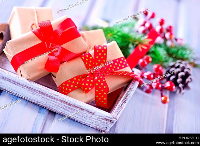 presents and christmas decoration on a table
