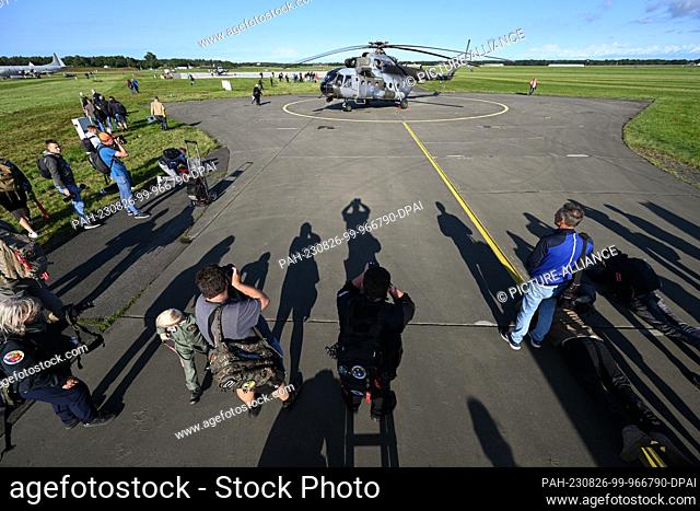 26 August 2023, Lower Saxony, Wurster Nordseeküste: Around 300 spotters were given the exclusive opportunity to experience the helicopters up close at the...