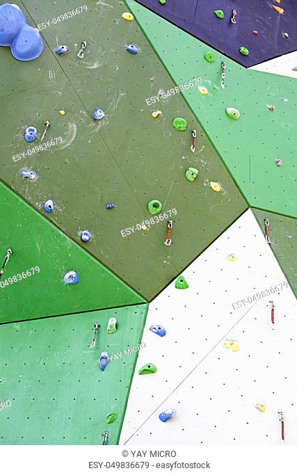 Professional climbing wall, detail of a wall for sports, air release, danger