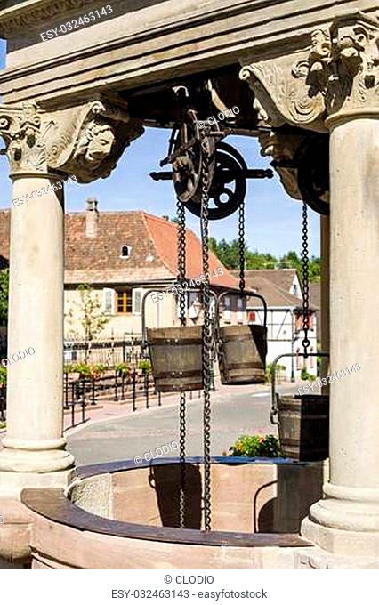 Boersch (Bas-Rhin, Alsace, France) - Old well with pulleys and wooden buckets