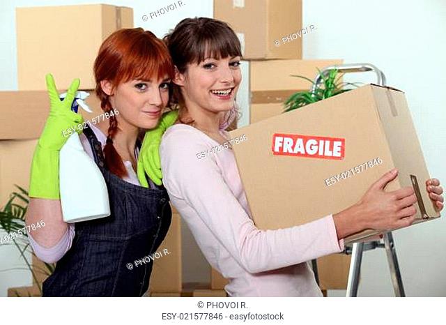 Two female friends moving house