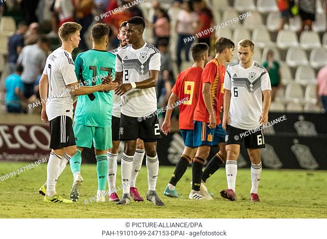 10 October 2019, Spain, Córdoba: Soccer, U-21 men: international matches, Spain - Germany at Nuevo Arcangel Stadium. German and Spanish players are on the court...