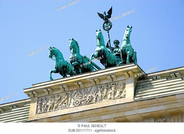 Mitte Brandenburg Gate or Bransenburger Tor in Pariser Platz leading to Unter den Linden and the Royal Palaces with the Quadriga of Victory on top