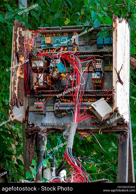Chaotic wiring junction box open