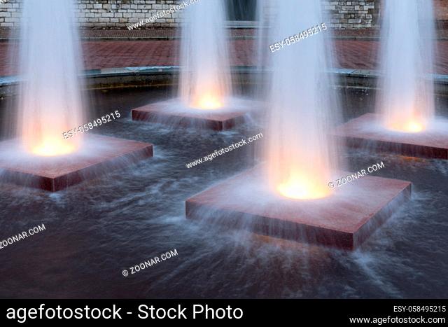Four illuminated fountains in medieval centre of Middelburg, The Netherlands