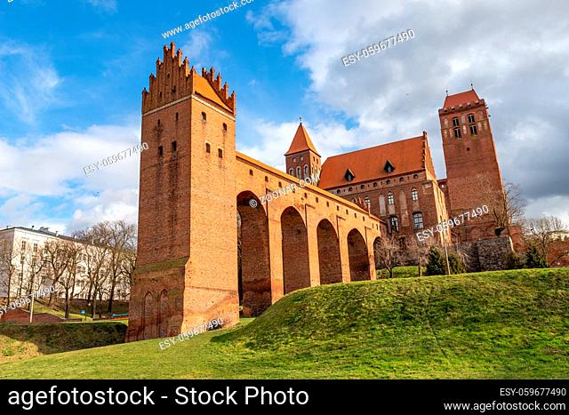 Kwidzyn, pomorskie / Poland - February, 28, 2020: Teutonic castle in Central Europe. Huge red brick building. Spring season