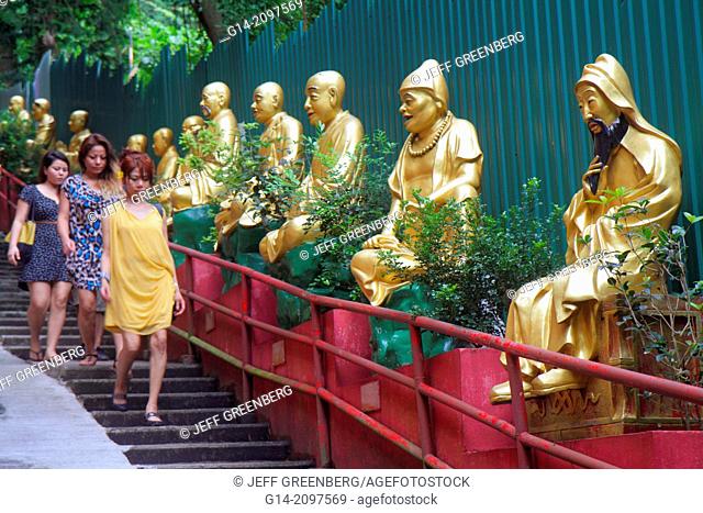 China, Hong Kong, New Territories, Sha Tin, Ten Thousand 10, 000 Buddhas Monastery, golden, path, statues, Buddha, Buddhism, Asian, woman, descending