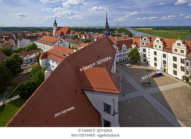 Views over Castle Hartenfels to St. Mary's Church at river Elbe in Torgau, Saxony, Germany
