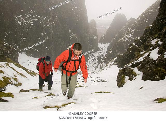 Climbers in the Quiraing on the Isle of Skye Scotland