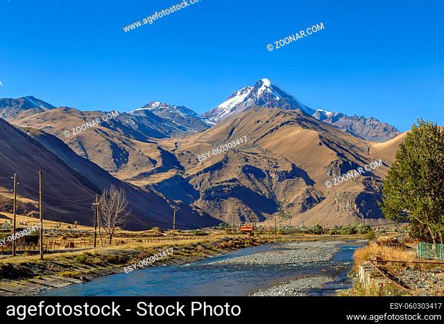 Landscape with river and Mount Kazbek from Village Sno, Georgia