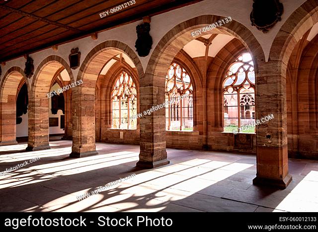 Basel, Switzerland - March 10, 2019: The cloister at the Basel Minster. The Basel Minster is one of the main landmarks and tourist attractions of the Swiss city...