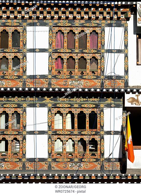 Traditional front with ornate windows, Bhutan