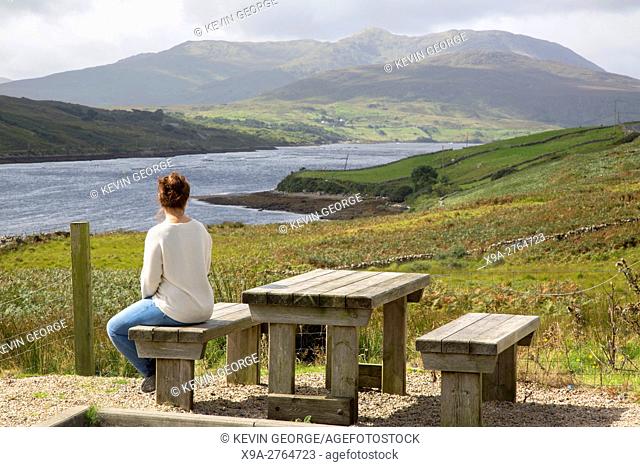 Young Woman looking at Killary Fjord Lake; Leenane, Connemara; Galway; Ireland