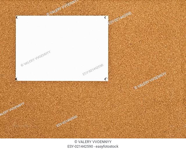 sheet of paper on cork board