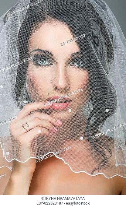Wedding. Portrait of Affectionate Bride Brunette in Veil