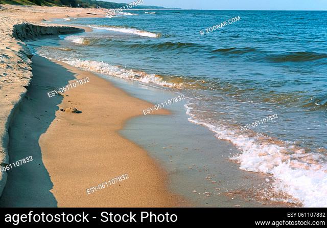 coastline of the sea, uneven sandy shore of the Baltic sea