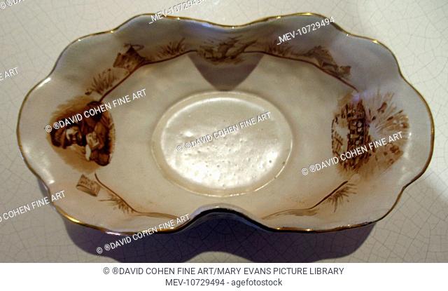 'Bairnsfather Ware dish with ornate border round the rim.  'Where did that one go .' and 'When the 'ell is it.' 'A Souvenir of the Great War' on base