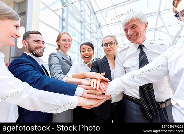 Business people happy team stack hands support concept