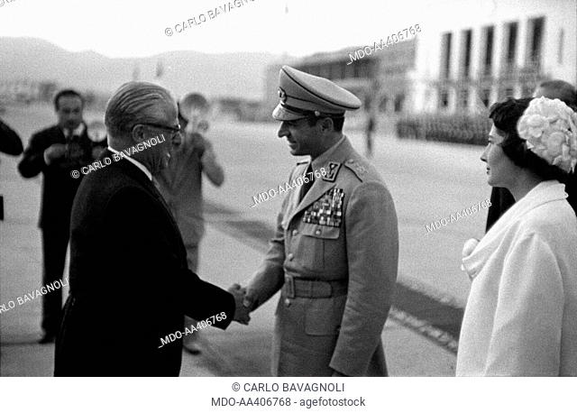 Giovanni Gronchi shaking hands with the Shah Mohammad Reza Pahlavi. Italian politician and President of the Italian Republic Giovanni Gronchi shaking hands with...