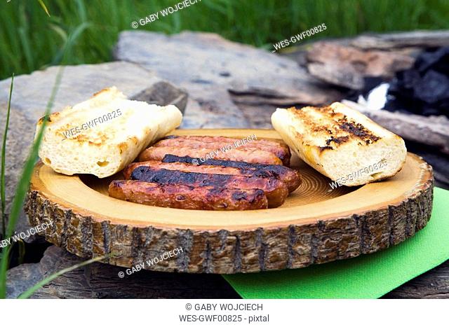 Barbecue, sausages with baguette