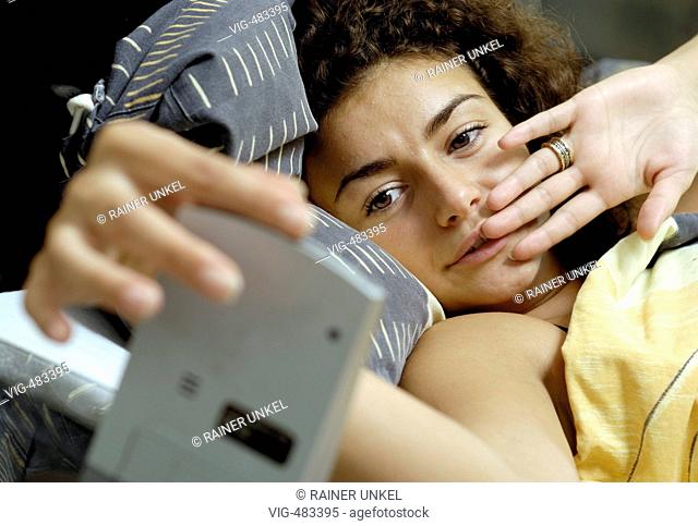 GERMANY : Young woman in bed. - Duesseldorf, GERMANY, 03/08/2007