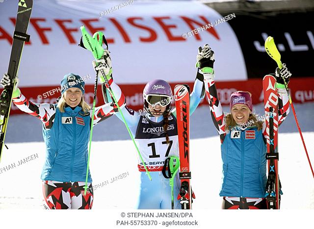 (L-R) Silver medal winner Nicole Hosp of Austria, gold medal winner Tina Maze of Slovenia and bronze medal winner Michaela Kirchgasser of Austria react after...
