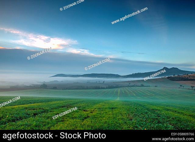 Landscape covered with fog in Central Bohemian Uplands, Czech Republic. Central Bohemian Uplands is a mountain range located in northern Bohemia