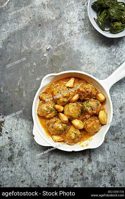 Meatballs cooked in a tomato sauce