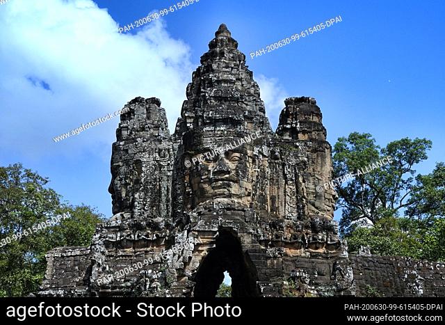 23 October 2019, Cambodia, Siem Reab: The south gate of the capital Angkor Thom in the temple complex. King Jayavarman VII had the ""Great City"" built in the...
