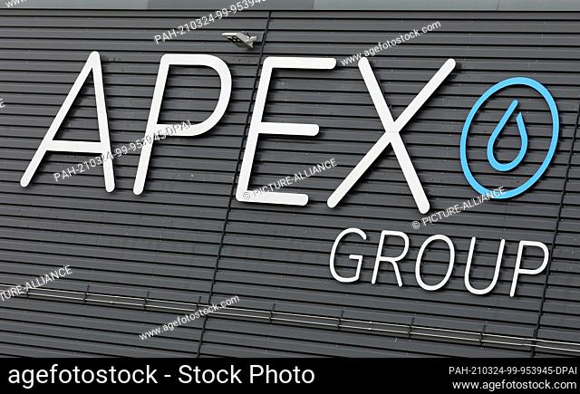 24 March 2021, Mecklenburg-Western Pomerania, Laage: The logo of APEX Energy Teterow. The new 2MW hydrogen power plant of APEX Energy Teterow GmbH is to be...