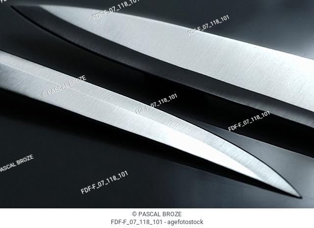 Close-up of two kitchen knives